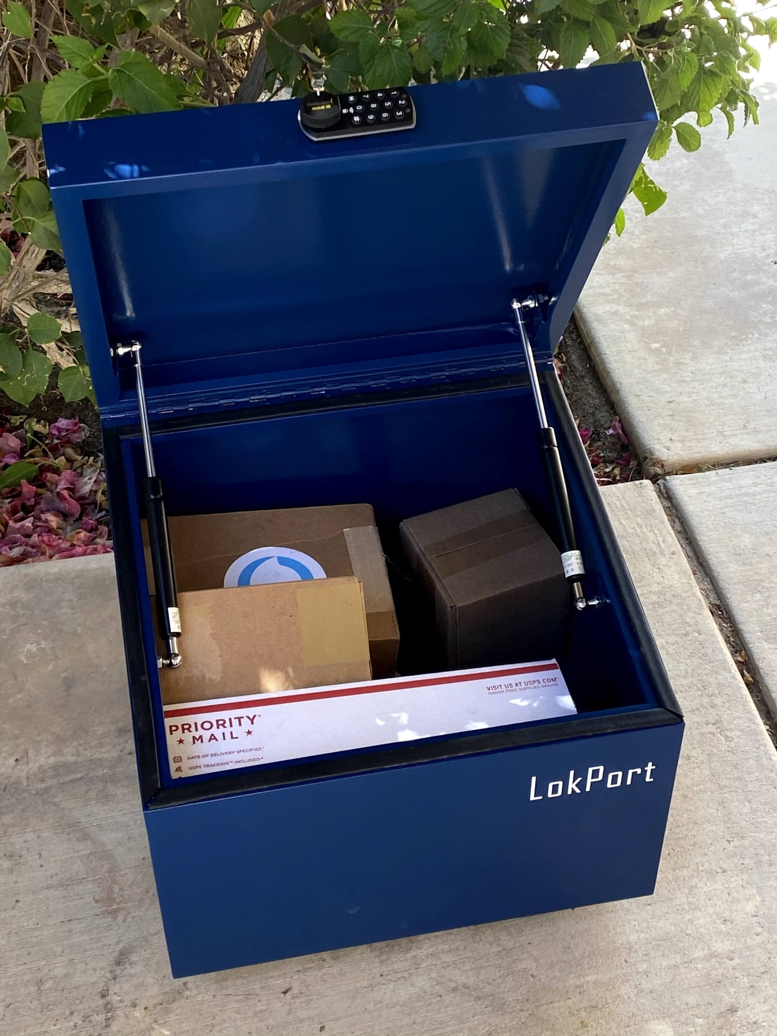 LokPort pilot unit — open lid showing interior package capacity